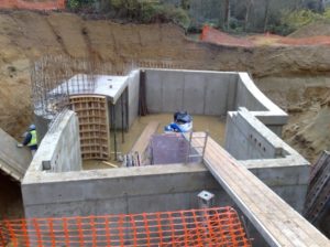 Finished concrete walls of basement.