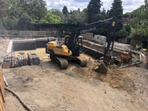 Basement construction in Esher.