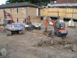 Excavation for ground-beams and drainage.