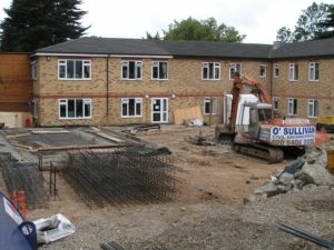 Excavation for ground-beams and drainage.