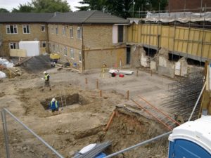 Excavation for ground-beams and drainage.