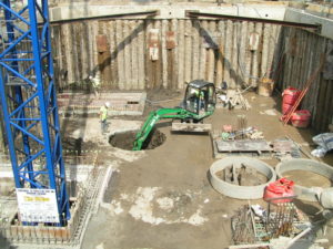 Excavation for underground pump chamber.